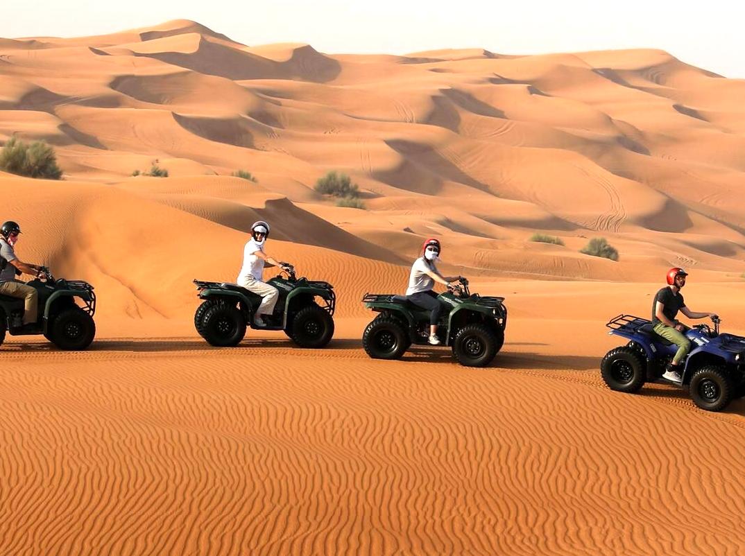 Exciting dune exploration through quad biking experiences.